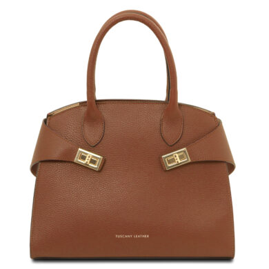 Brown pebbled leather handbag with two top handles and gold-tone buckle straps.