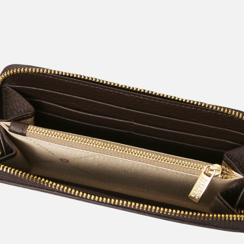 Open brown leather wallet showing card slots and a central gold zipper pocket on a light background.