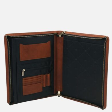 Open brown leather travel organizer with card slots, zip pocket, and built-in compartments on a black fabric interior.
