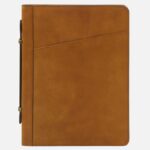 Tan leather portfolio binder with diagonal stitched panel and side straps; Tuscany Leather branding visible on bottom corner.