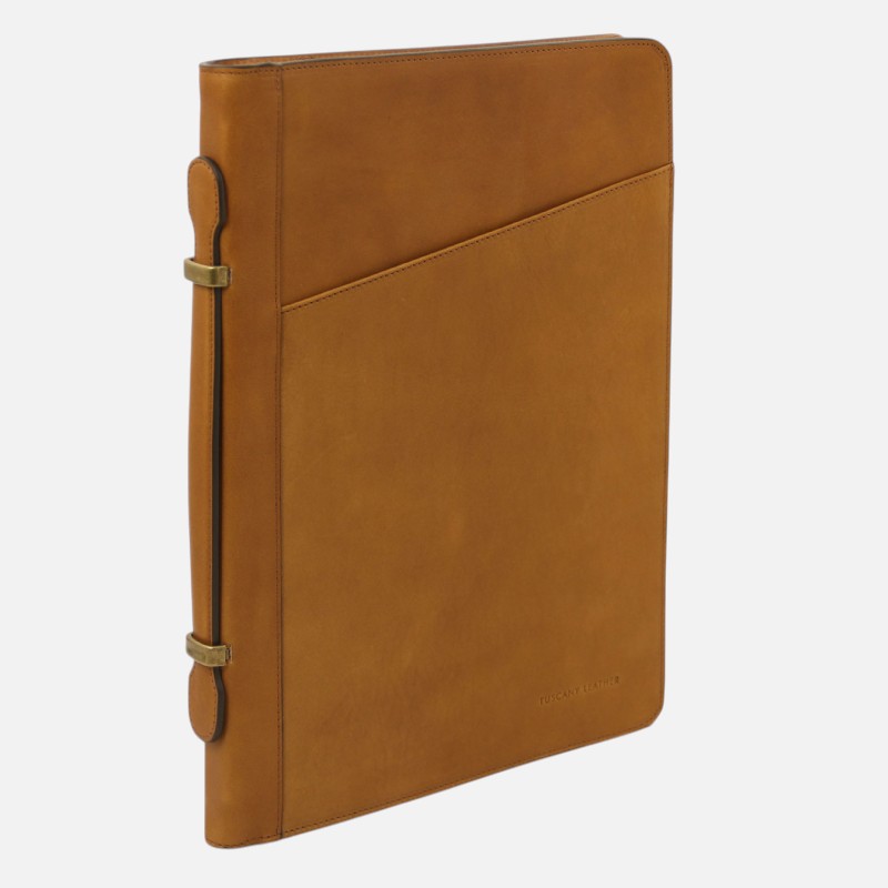 Tan leather portfolio binder with a diagonal front pocket and brass side clasps, shown upright from a slight angle.