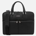 Black leather briefcase with dual top handles, front zipper pockets, and a detachable shoulder strap on a white background.