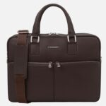 Dark brown leather briefcase with two front pockets, silver zippers, two top handles, and a detachable shoulder strap.
