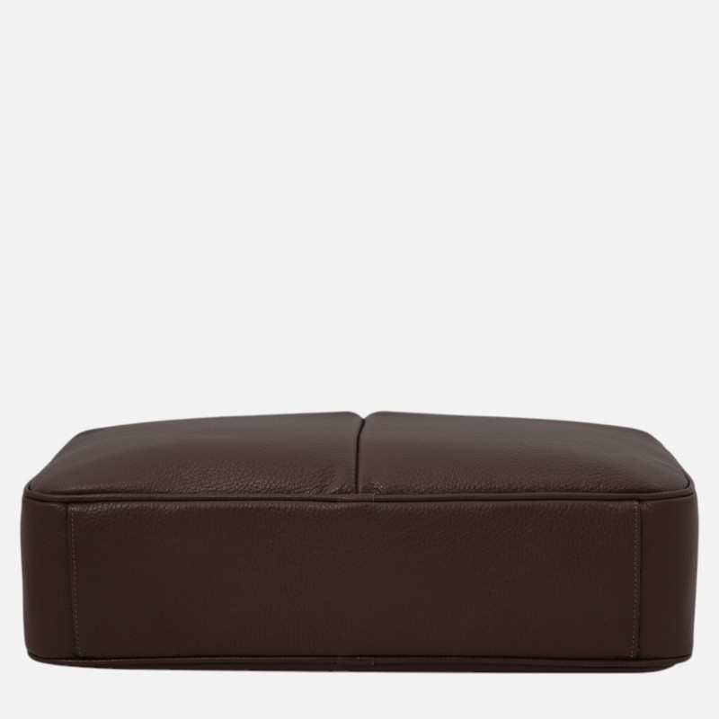 Bottom view of a dark brown pebbled leather rectangular pouch with a central seam.