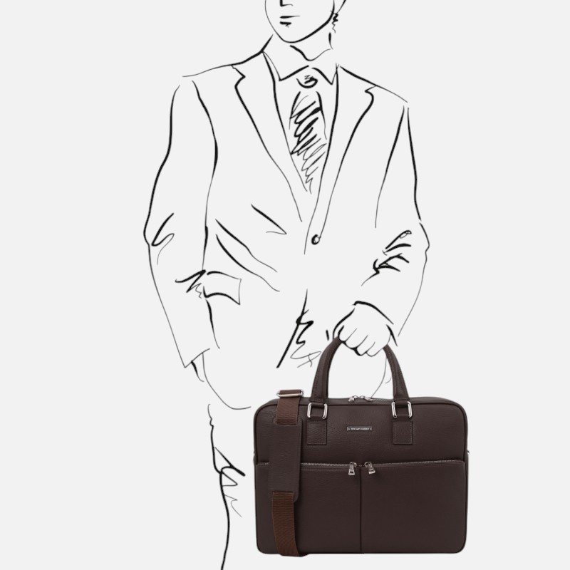 Sketch of a person in a suit holding a brown briefcase by its handle, professional appearance implied.