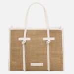 Woven straw tote bag with white leather trim and handles, front label 'Tuscany Leather' for a light, summery accessory
