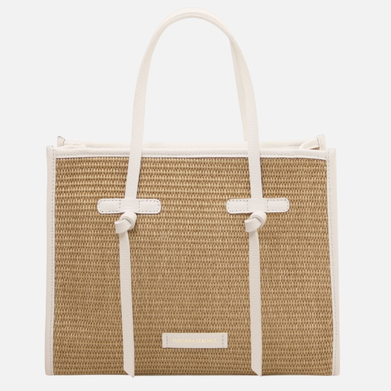 Woven straw tote bag with white leather trim and handles, front label 'Tuscany Leather' for a light, summery accessory