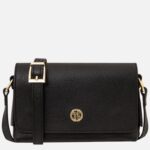 Black pebbled leather crossbody bag with a gold-tone buckle and small circular gold logo on the front flap.