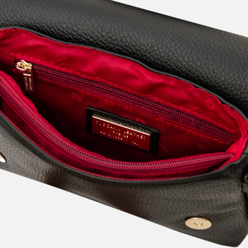 Black leather handbag opened to reveal a bright red interior with a zippered pocket and a gold zipper pull, plus a metal brand plate inside.