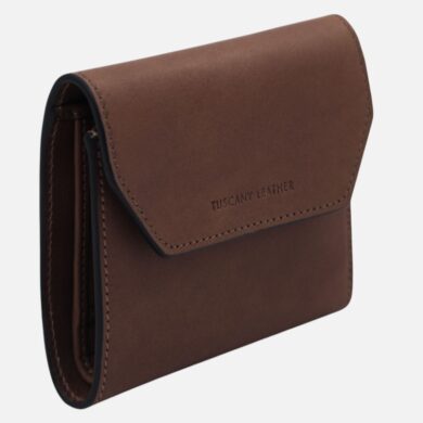Brown leather wallet with a flap closure, angled view showing stitching and 'Tuscany Leather' branding.