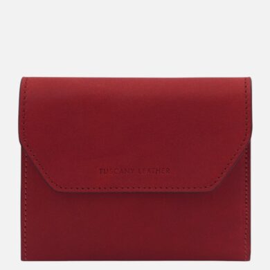 Red leather wallet with a flap closure and subtle stitching, branded Tuscany Leather at center front.