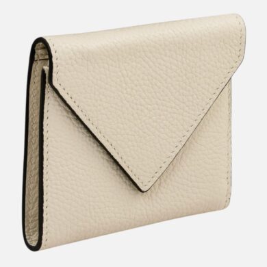 Beige textured leather wallet with an envelope-style flap, standing upright to show its outer design.
