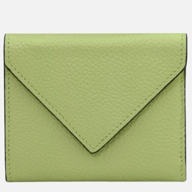 Lime green leather wallet with a triangular flap and visible stitching on the edges, close-up product shot