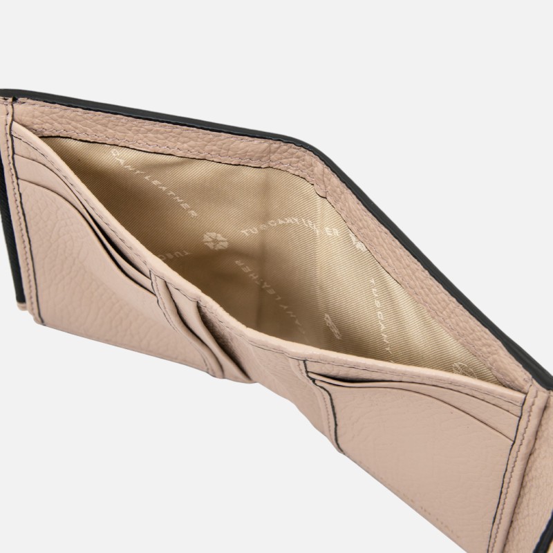 Open pink leather wallet with card slots and beige fabric lining showing interior pockets.