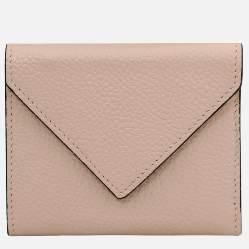 Peach pebble-grain leather wallet with an envelope-style flap, front view.