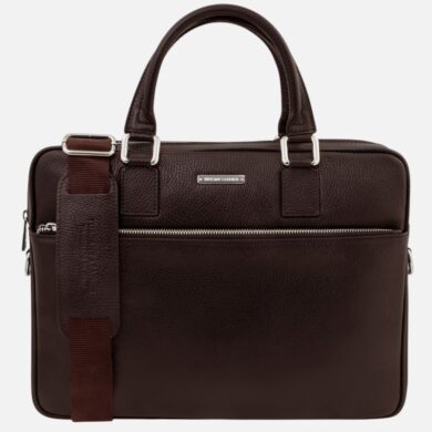 Dark brown leather briefcase with two top handles and a detachable shoulder strap, front zip pocket visible.