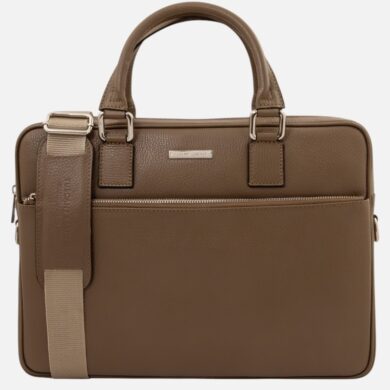 Brown leather briefcase with top handles and a removable beige shoulder strap, front zip pocket, and metal nameplate on the flap.