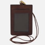 Brown leather ID badge holder with clear window and lanyard, hanging strap visible at top and around the card slot area.