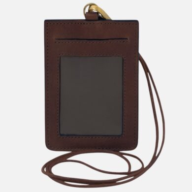 Brown leather ID badge holder with clear window and lanyard, hanging strap visible at top and around the card slot area.