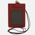 Red leather ID badge holder with a transparent window and a brown lanyard, shown from the front.