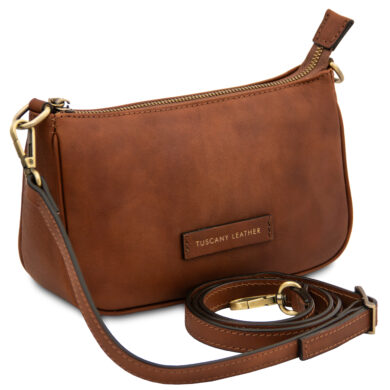 Brown leather crossbody bag with a detachable strap and gold-tone hardware, labeled Tuscany Leather on the front