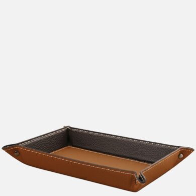 Brown leather tray with dark brown interior, rectangular and shallow, stitched edges, and metal snap accents at ends for a tidy organizer.