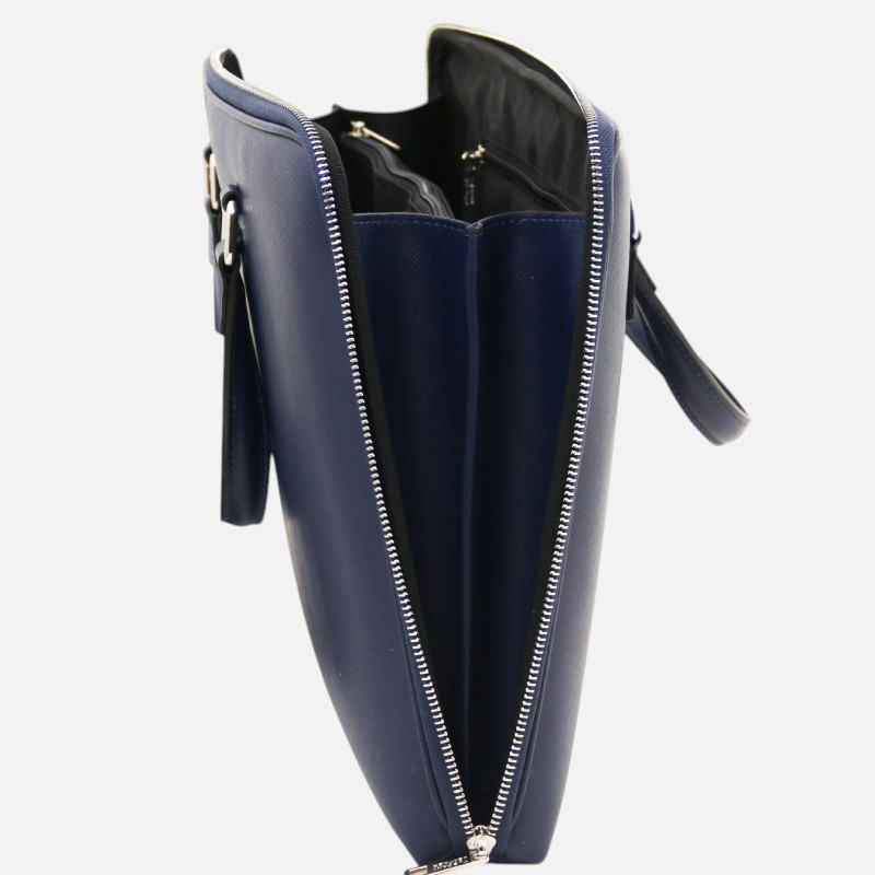Navy blue handbag with two silver zippers open, showing interior compartments and a divider.