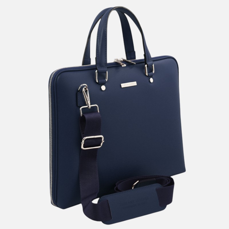 Navy blue laptop bag with two top handles and a detachable shoulder strap on a light background