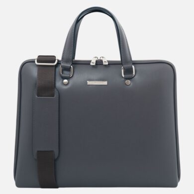 Navy blue leather briefcase with two top handles, a detachable shoulder strap, and silver hardware against a light background.