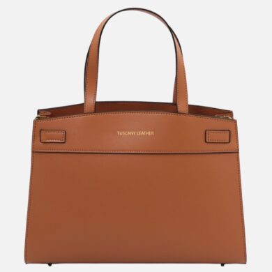 Tan leather tote bag with two handles and gold 'TUSCANY LEATHER' branding on the front.