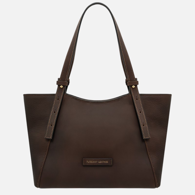 Brown leather tote bag with double handles and contrast stitching; small Tuscany Leather tag on the front.