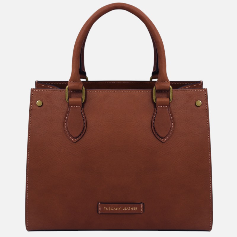 Brown leather handbag with two rounded handles, visible stitching, and a small Tuscany Leather label on the front.