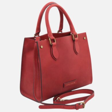 Red leather tote with double top handles, gold hardware, and a detachable shoulder strap on a white background.