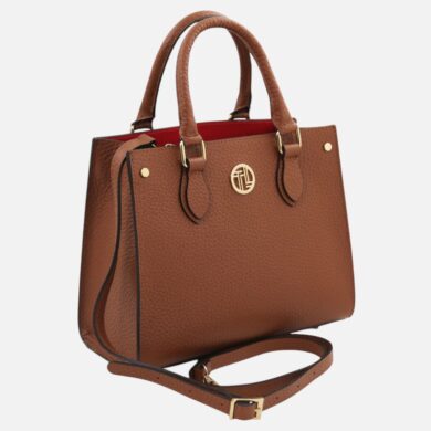 Brown pebbled leather tote bag with double handles and detachable strap, gold hardware, and a red interior visible at the top.