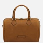 Tan leather handbag with two top handles and a small brand plaque reading Tuscany Leather on a white background.