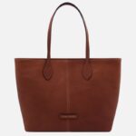 Brown leather tote bag with two top handles and a central seam detail