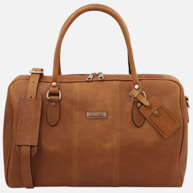 Tan leather duffel bag with two top handles, a detachable shoulder strap, and stitched detailing; has luggage tags attached.