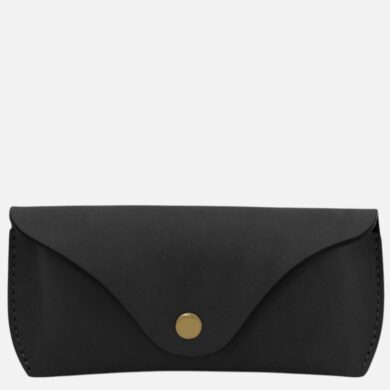 Black leather compact wallet with a fold-over flap and brass snap closure