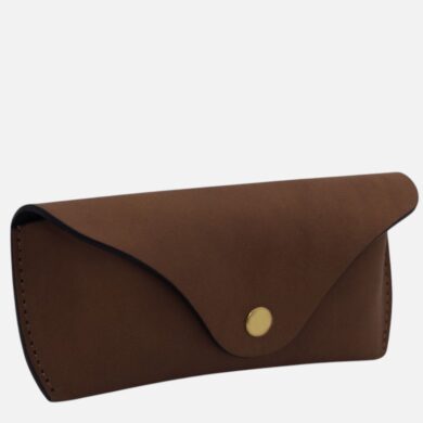 Brown leather envelope-style wallet with a brass snap closure.