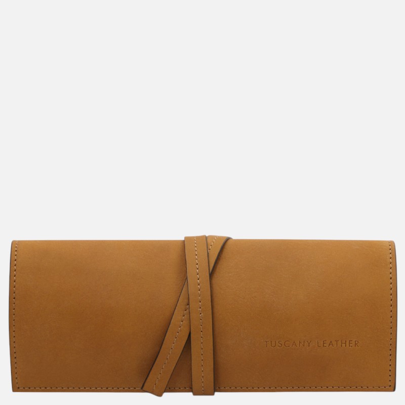 Tan leather wallet with a wraparound strap closure and stitched edges, branding visible on the lower right (Tuscany Leather).