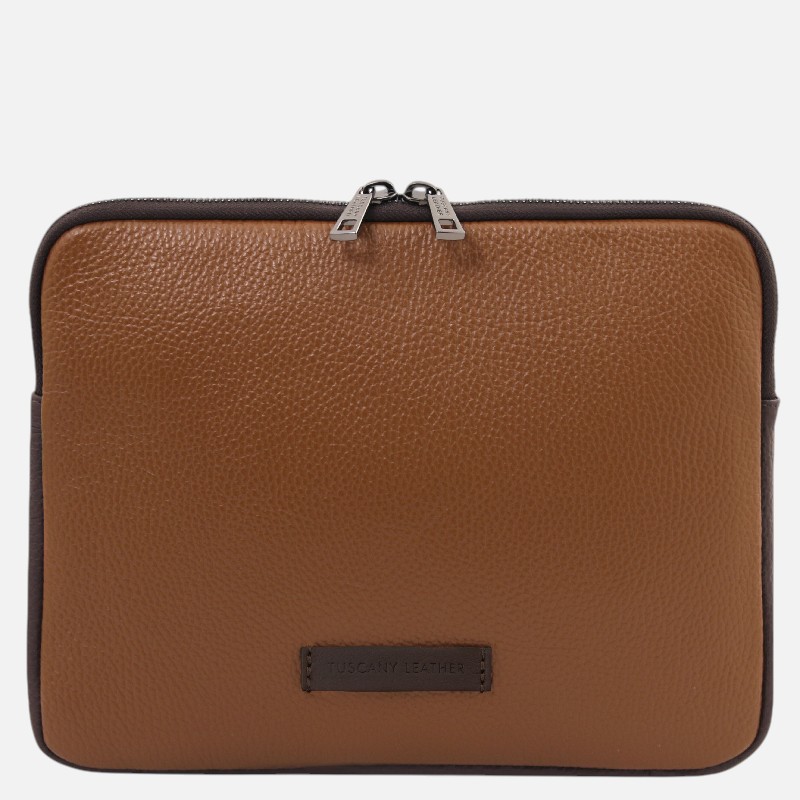 Brown pebbled leather zippered case with dark trim, labeled Tuscany Leather on the front center, likely a tablet or small laptop pouch.