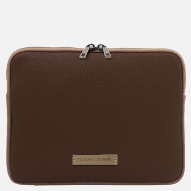 Brown leather zippered square laptop sleeve with light tan trim and a metal label reading 'Tuscany Leather' on the front.