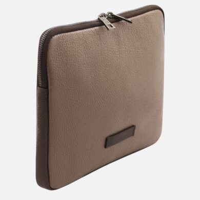 Tan textured leather zippered pouch with dark brown sides, standing upright against a light background.