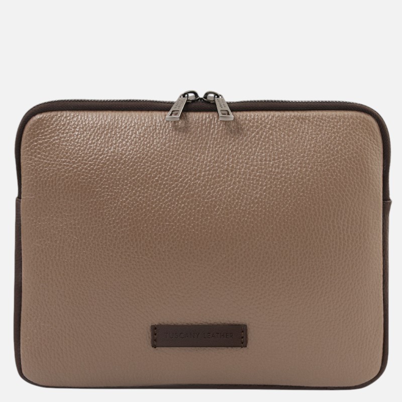 Tan pebble-grain leather zippered pouch with dark brown trim and a double zipper, featuring a Tuscany Leather brand patch.