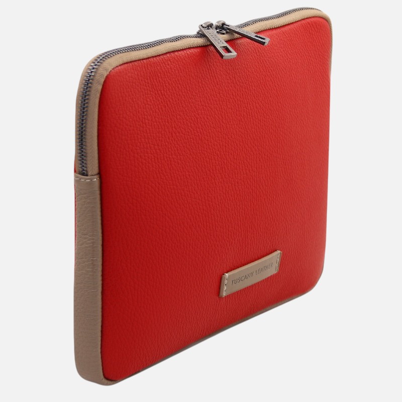 Red leather zippered wallet with beige side panels and a metal brand plate reading TUSCAN LEATHER