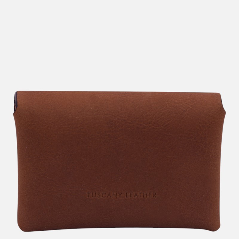Brown leather pouch with a minimal Tuscany Leather engraving, laid flat against a light background.