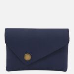 Navy blue envelope-style clutch wallet with a brass snap button at the front.