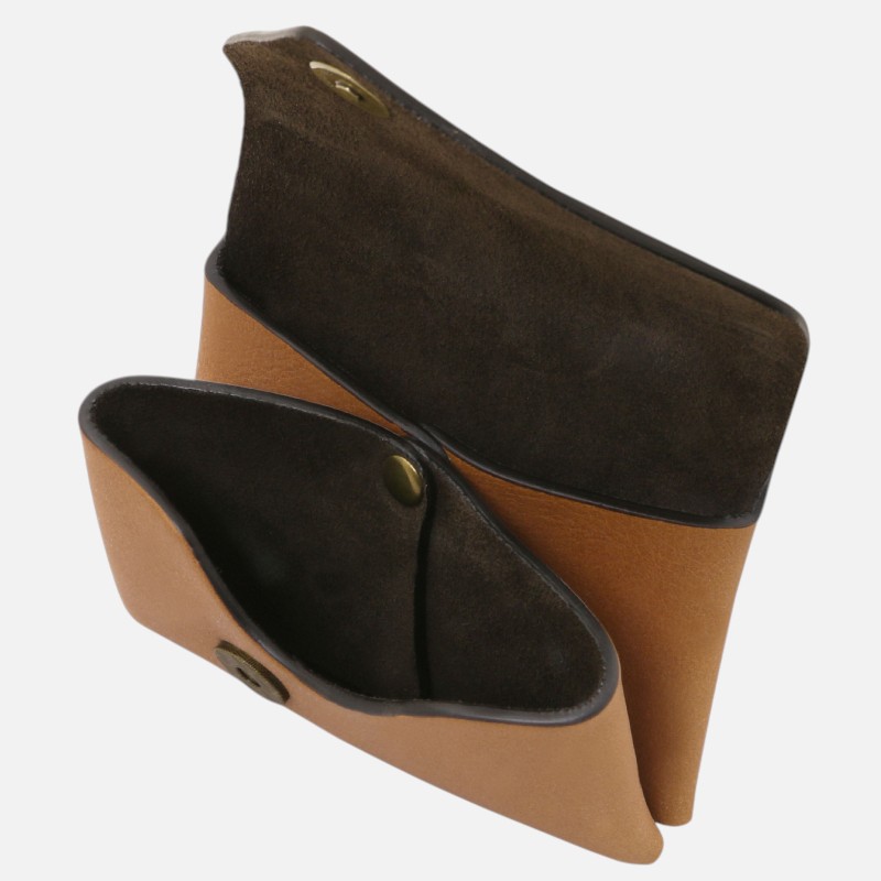 Tan leather wallet opened to reveal two interior pockets and snap button closure, showing a dark suede lining.