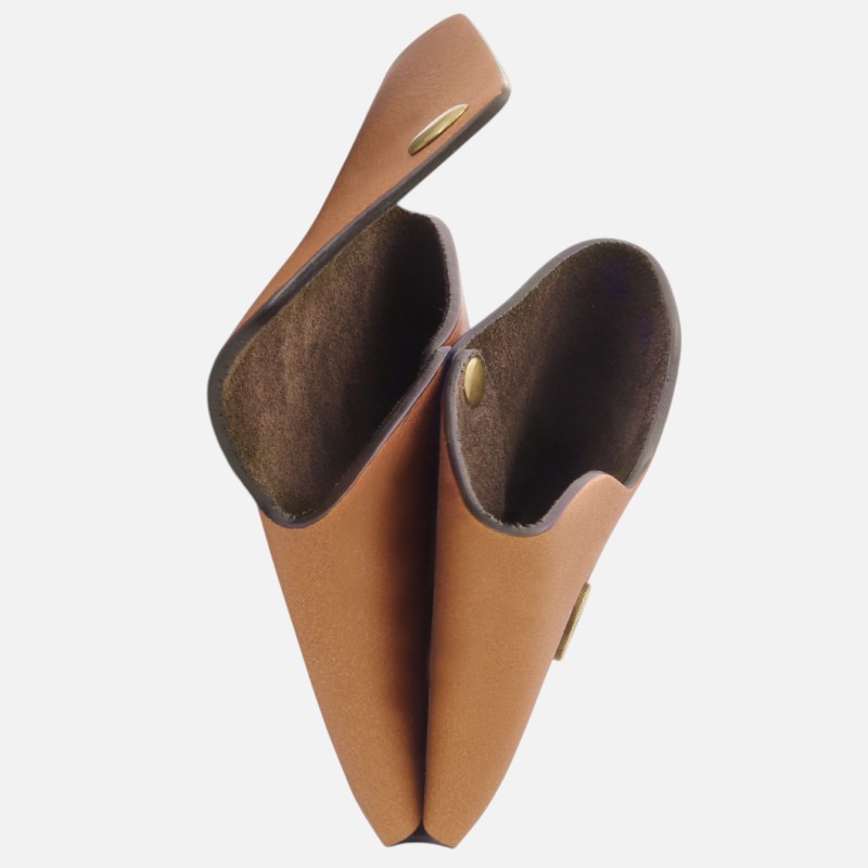 Pair of tan leather tool pouches with brass snap closures, opened to reveal dark suede interiors