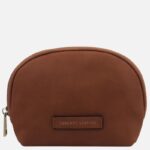 Brown leather zippered pouch with rounded top and a stitched Tuscany Leather label on the front.